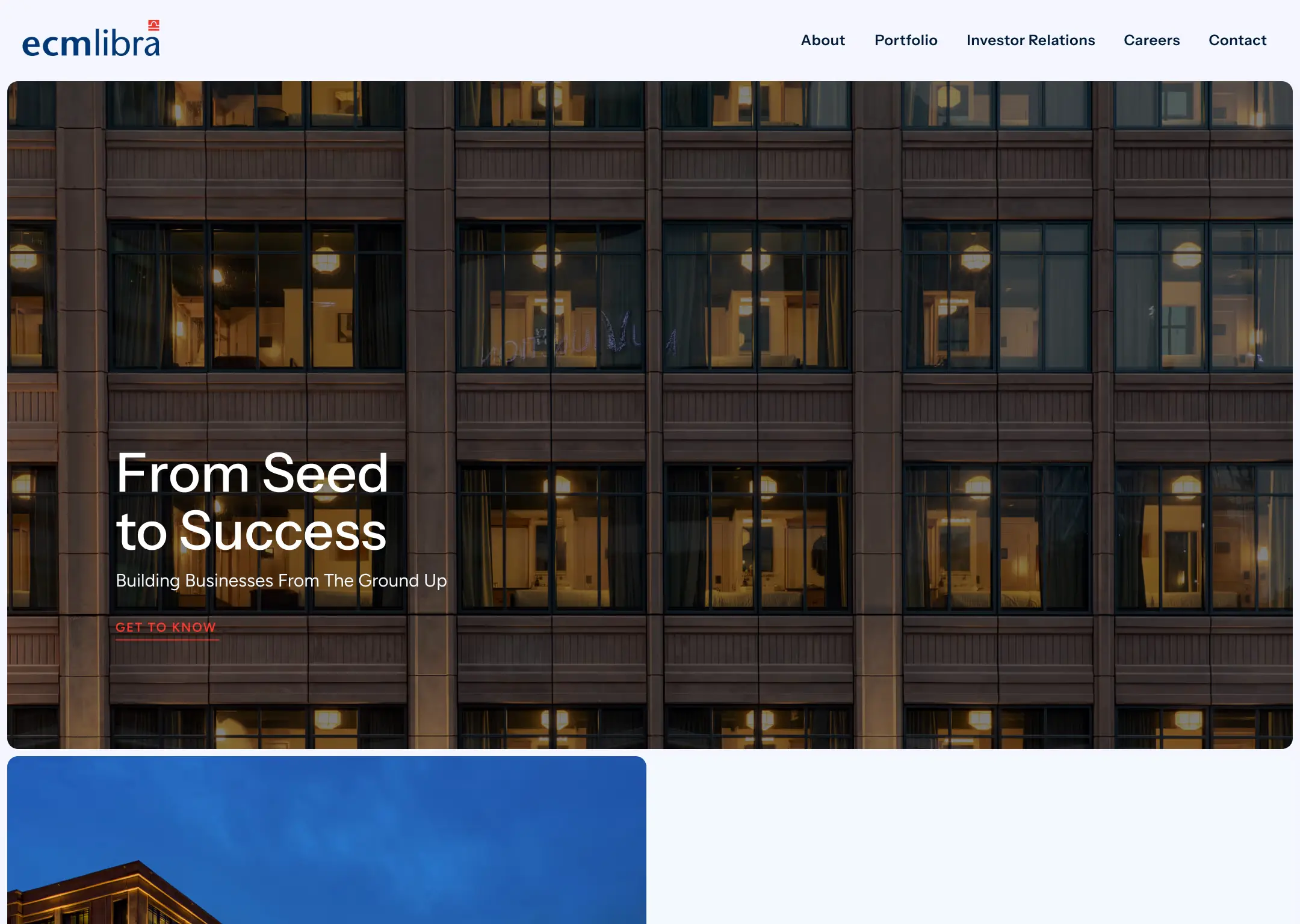The top of the ECM Libra homepage: the logo and menu above a photograph of a hotel facade at night, with the headline “From Seed to Success” and the line “Building businesses from the ground up”.